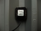 the labelled side of the puck antenna should point toiward the ground