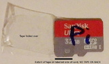 attachment of tape to ease removal of micro SD card.  DO NOT put tape on the unlabelled side of the micro SD card.